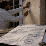 Artisan entreprise ITE pose isolant extérieur maison