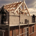 Rehausser toiture sur maison en briques